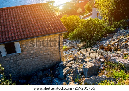 Living buildings with gardens in Perast city, Montenegro