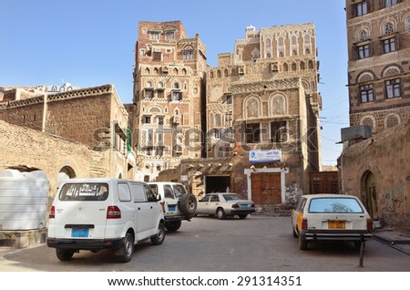 Sana\'a, Yemen, March, 18, 2014. Yemeni scene: Cars on the street in the center of old town Sana\'a