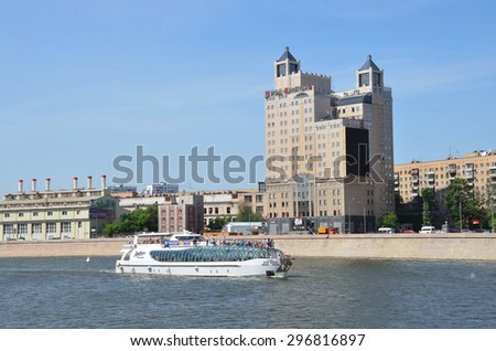 Moscow, Russia, June, 01,2014. Russian scene: Nobody, floating restaurant passing by the building IFH \