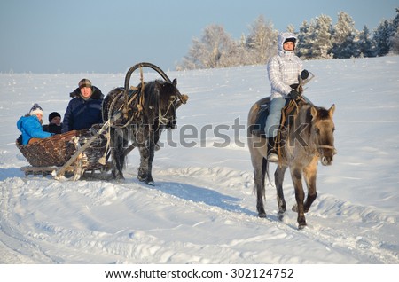 Kaga, Bashkortostan, Russia, January, 03, 2013. People travel in horse-drawn sleds in the winter