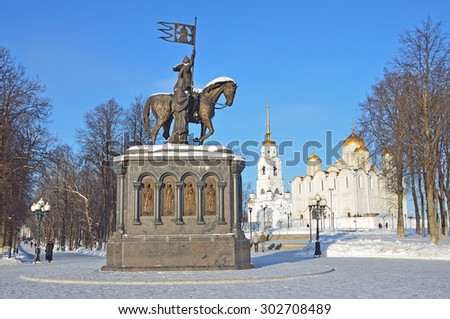 Vladimir, Russia, January, 26, 2014, Russian scene: monument in honor of Prince Vladimir and St. Theodore [Fedor], in the background ancient Assumption [Uspensky] Cathedral in vwnter