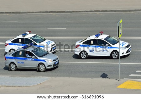 Moscow, Russia, May, 09, 2015, Russian scene: Nobody, cars of Police and Traffic police