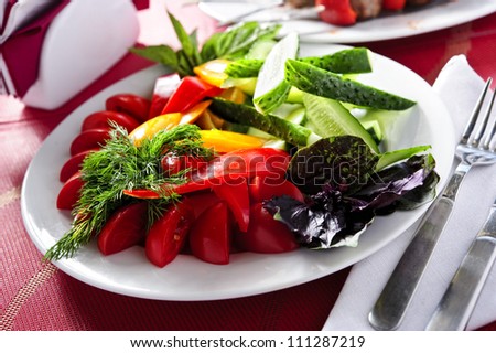 Plate of plane cut vegetables.