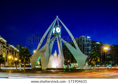 DUBAI, UAE - Dec 16: Clock tower roundabout in Deira December 16, 2013 in Dubai Deira, United Arab Emirates