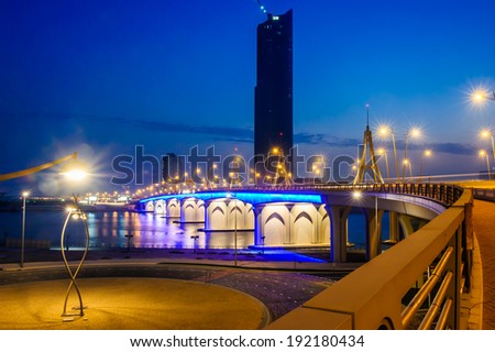 DUBAI, UAE - MAY 09 of 2014 : Business bay crossing bridge,13-lane-bridge, over the Dubai Creek,opened in March 2007.