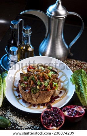 Plate of the fatosh salad,cooked traditional Arabic way