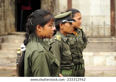 Patan, Nepal. August, 22, 2010. Nepalese female cop in Patan