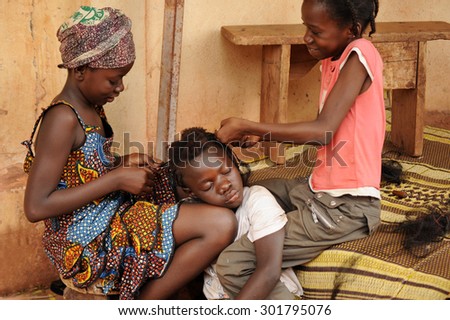 MOPTI, MALI - AUGUST - 26 - 2011\
African girls primping to party in the town