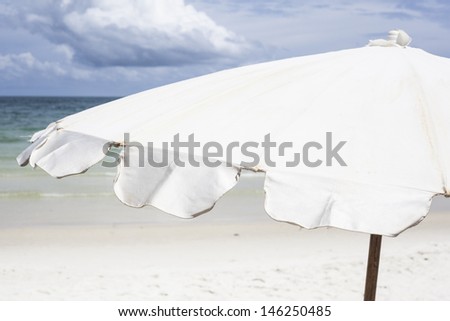 Beach with white umbrella