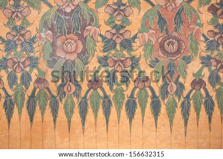 Lotus flower in traditional thai style art on wall of the temple