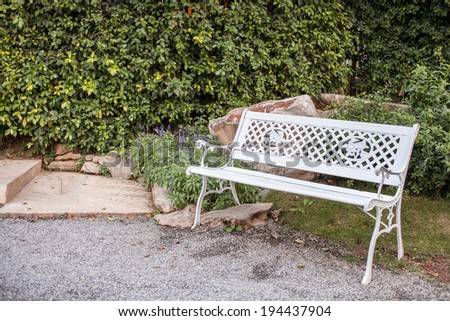 White bench seat in garden