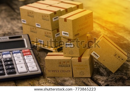 Pile of cardboard boxes products on wood pallet with calculator. Ideas for assembling a portfolio of assets which are held directly by investors. which expected return is maximized for a given level.