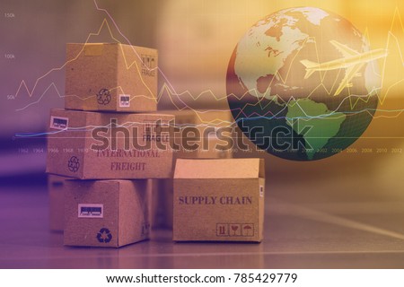 business concept: Small cardboard boxes with a plane flies above world map. Concept of  transportation, international freight, global shipping, goods or services remotely.  overseas trade, regional