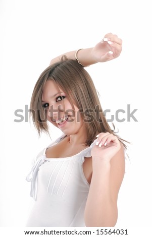 girl merrily smiles and peers into camera, white background