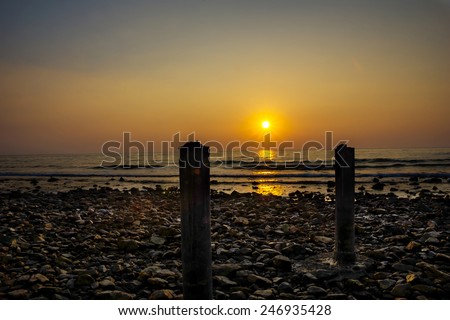 The sun sets in andaman sea outside the small paradise island Koh Chang in Thailand