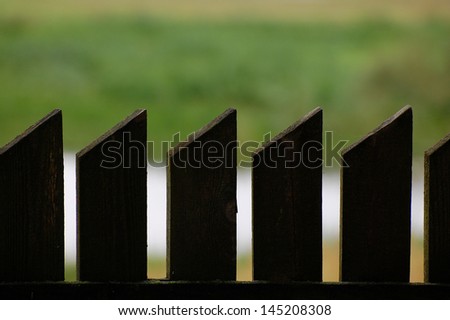 Spikes silhouettes of wooden fence