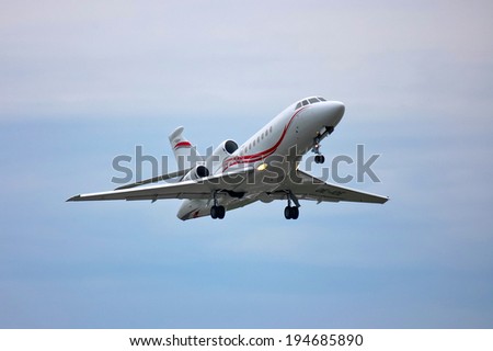 BORYSPIL, UKRAINE - MAY, 18, 2014: Dassault Falcon 900EX business jet - OE-IOE take off, Boryspil International Airport