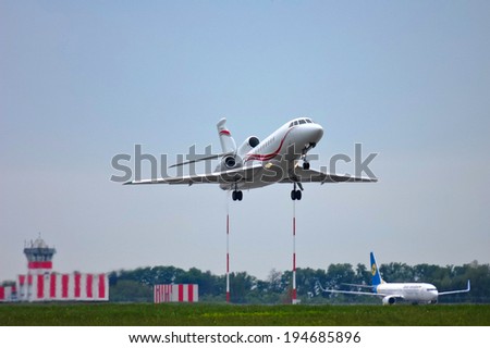 BORYSPIL, UKRAINE - MAY, 18, 2014: Dassault Falcon 900EX business jet - OE-IOE take off, Boryspil International Airport