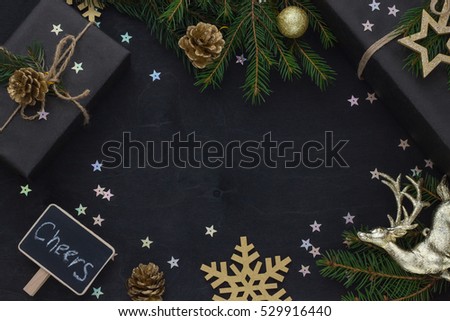 Christmas, New Year black stylish background and frame with gifts and a golden deer.