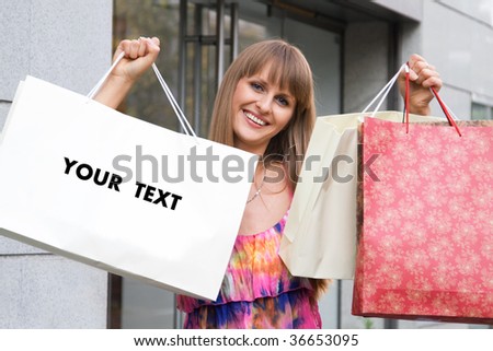 shopping girl with blank bag for your text