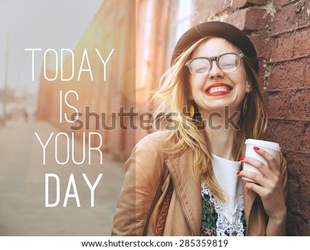 Woman in the street drinking morning coffee in sunshine light with motivational text