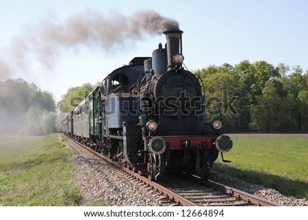 old steam engine powered train approaching
