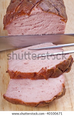 baked bavarian meat loaf on a wooden desk