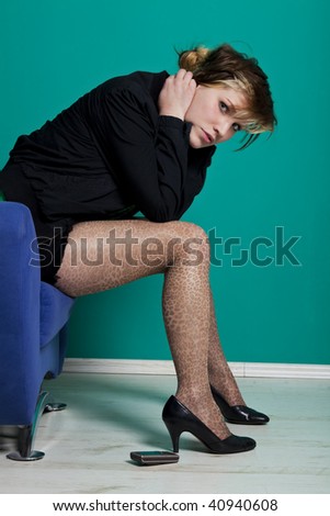young woman with leopard tights in despair