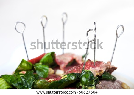 rolled raw veal cutlets and assorted ingredients
