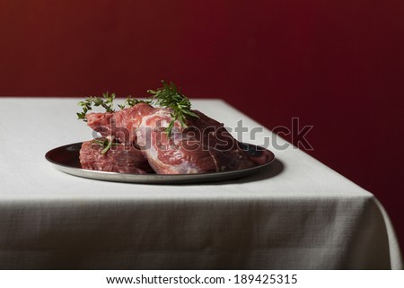 raw lamb meat on linen cloth