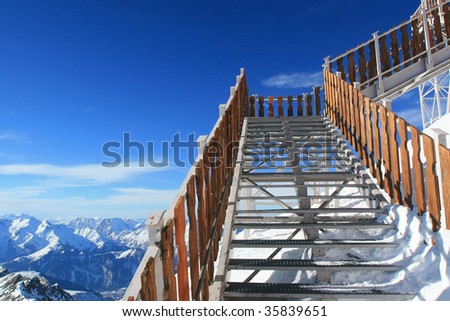 clear blue sky in the french Alps, stairway to the sky, ski resort in the Alps, skiing in France, winter holiday in Europe, alps d\'huez, clear blue sky in the winter, mountains covered in snow