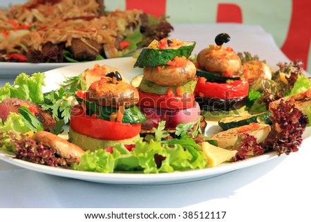 grilled vegetarian food on white plate