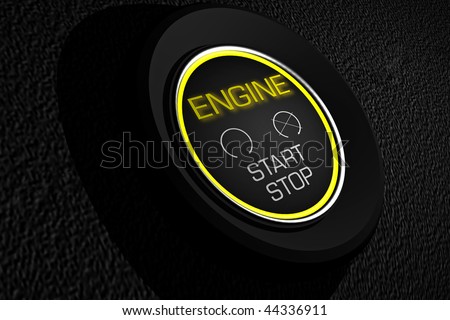 car start and stop  button on a black dashboard