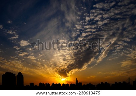 Sun rising over Shanghai city skyline