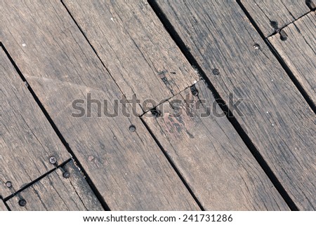 old and dry wood floor texture with line of knot connection