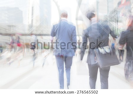 motion blur people in business area