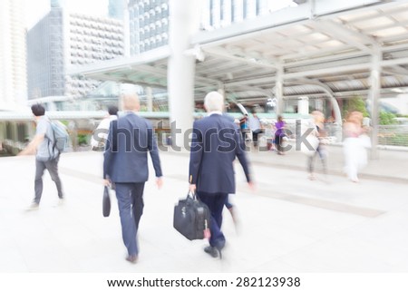 motion blur businessman traveling to work