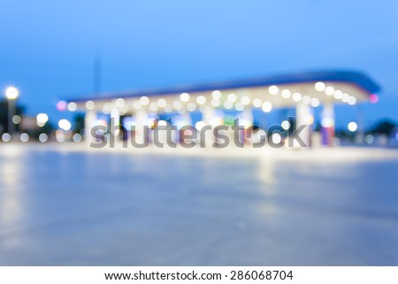 out of focus twilight gas station