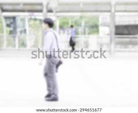 motion blue male office worker walking to work