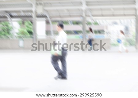 motion blur office worker walking to work