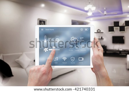 Smart remote home control system app. Living room interior in background.