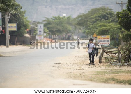 MUI NE - VIETNAM, APRIL 20 : Student were walking come back from school in mui ne, April 20, 2015