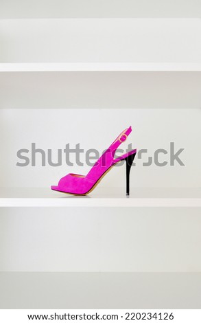 Pink shoes on the shelf
