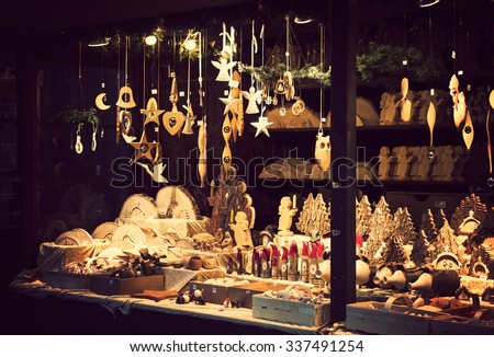 Illuminated Christmas fair kiosk with loads of lovely handcrafted wooden xmas decorations