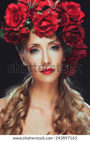 Girl in black and flowers on her head. Beauty women.Jewelry and beauty. perfect skin, blond hair. Girl with a stylish haircut. Skin care.