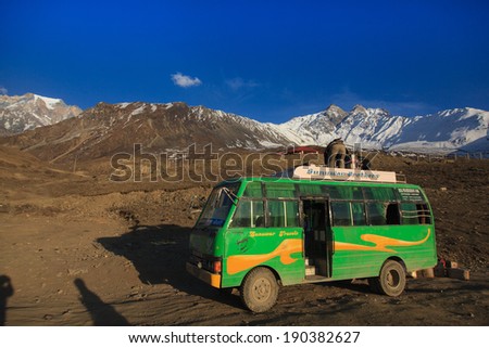 JOMSOM, NEPAL - CIRCA APRIL 2014: Local bus is the primary means of transport in the village of Jomsom circa April 2014 in Jomsom.