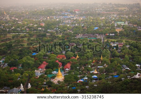 Mandalay with , temples and pagodas seen from mandalay hill at sunset, Burma