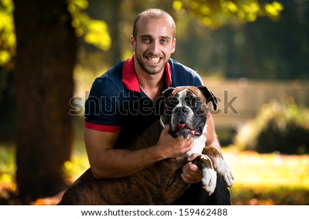 Man Holding Dog