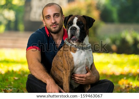 Young Man With Dog