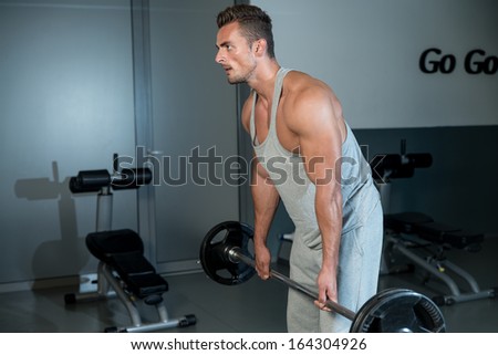Ready To Lift. Man Performing Heavy Deadlift In A Gym